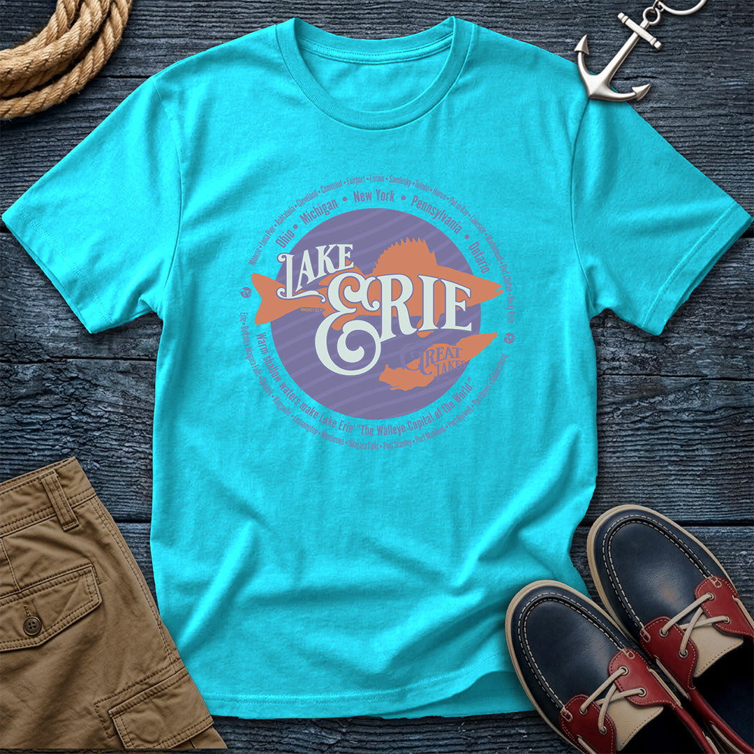Lake Erie Walleye Capital of the World Blue tee. Shoreline cities from all five border states. Comfort Colors 1717 garment-dyed cotton in Bay. For Ohio and Erie shore regulars.