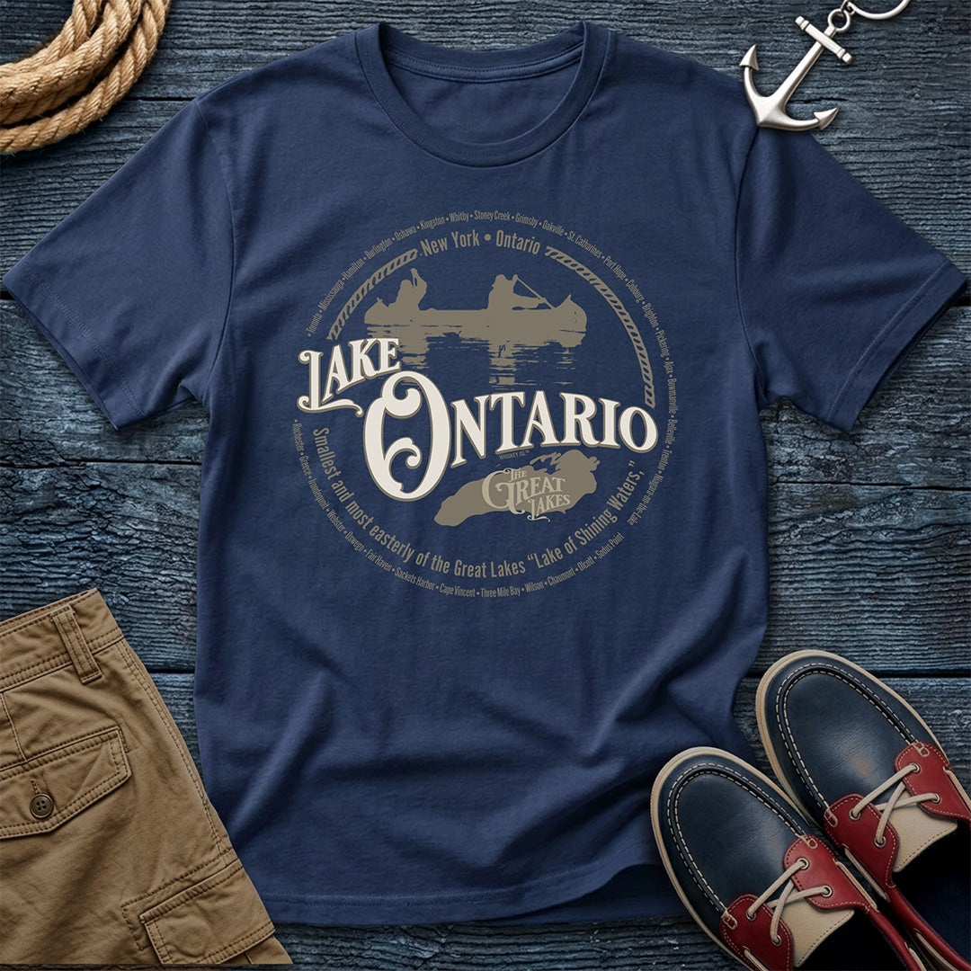 Lake Ontario Great Lakes Navy tee. New York and Ontario shoreline cities. Canoe and lake outline design on Comfort Colors 1717 garment-dyed cotton. The easternmost lake, fully represented.