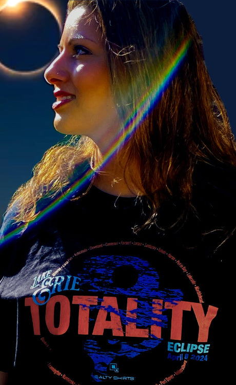 Woman watching eclipse wearing Lake Erie Totality t-shirt