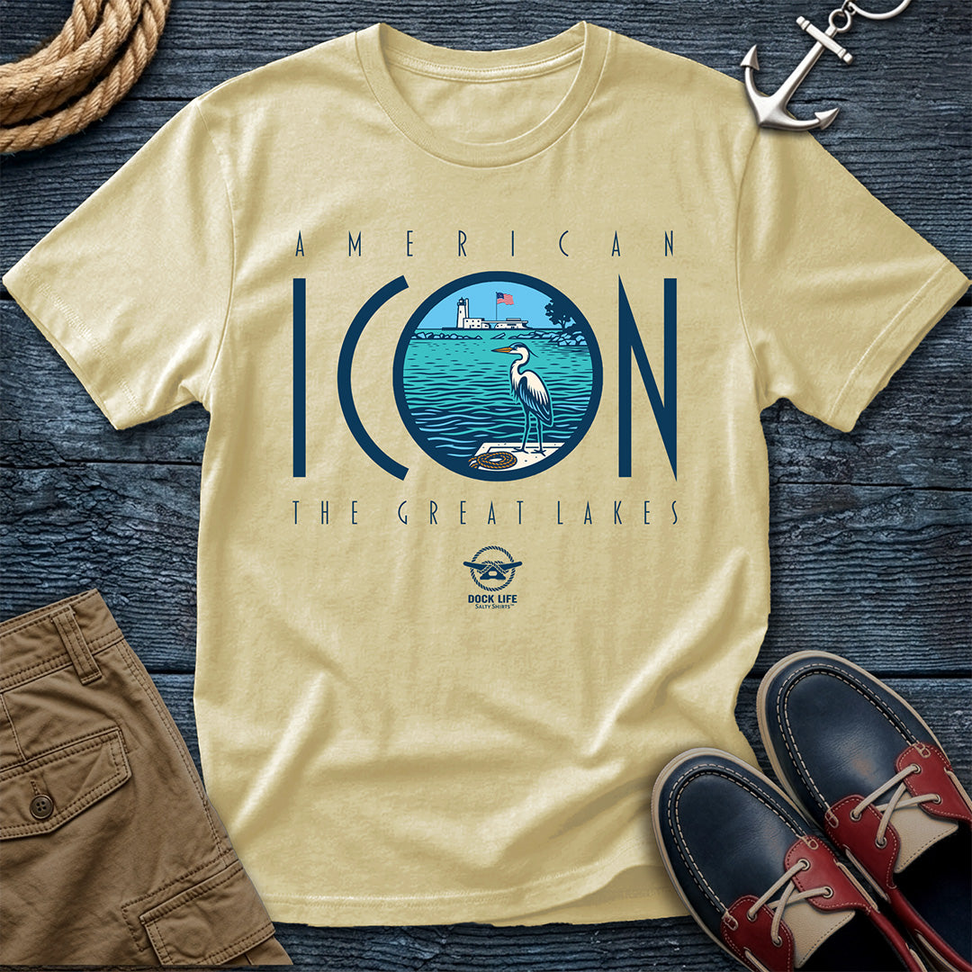 Banana t-shirt with 'American Icon The Great Lakes' design on a wooden surface with shorts and shoes.