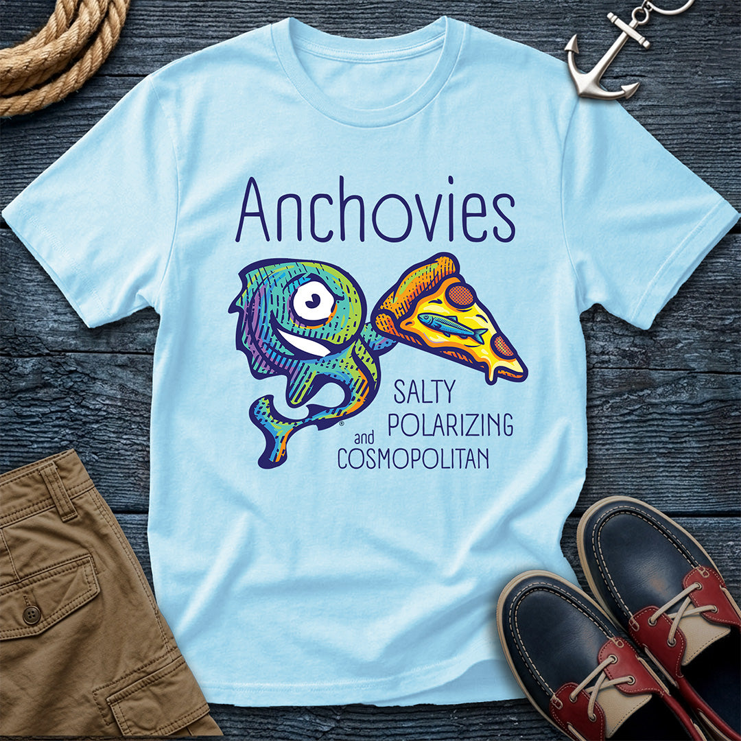 A Chambray short-sleeve crewneck t-shirt featuring a colorful graphic of Salty the anchovy mascot diving into a pizza slice, with the text 'Anchovies SALTY POLARIZING and COSMOPOLITAN' printed on the front.