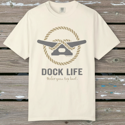 Ivory t-shirt with 'Dock Life' graphic design on a wooden background