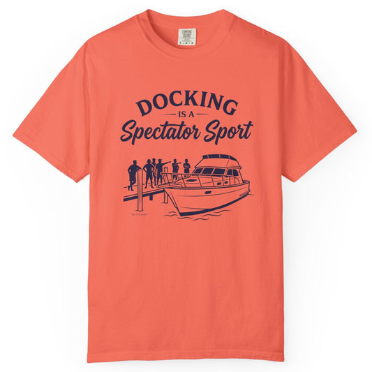 Coral t-shirt with a graphic and text 'Docking is a Spectator Sport' on a white background