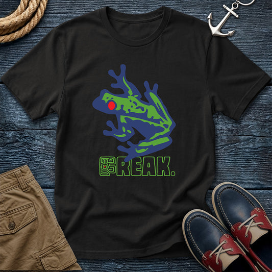 Freak Tree Frog Tee | Amphibian Freak of Nature in Black, Comfort Colors 1717 garment-dyed shirt with a red-eyed tree frog graphic and maze-lettered FREAK design