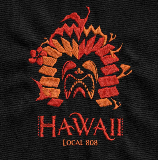 Embroidered Hawaiian tiki design on a black background with 'Hawaii Local 808' text.