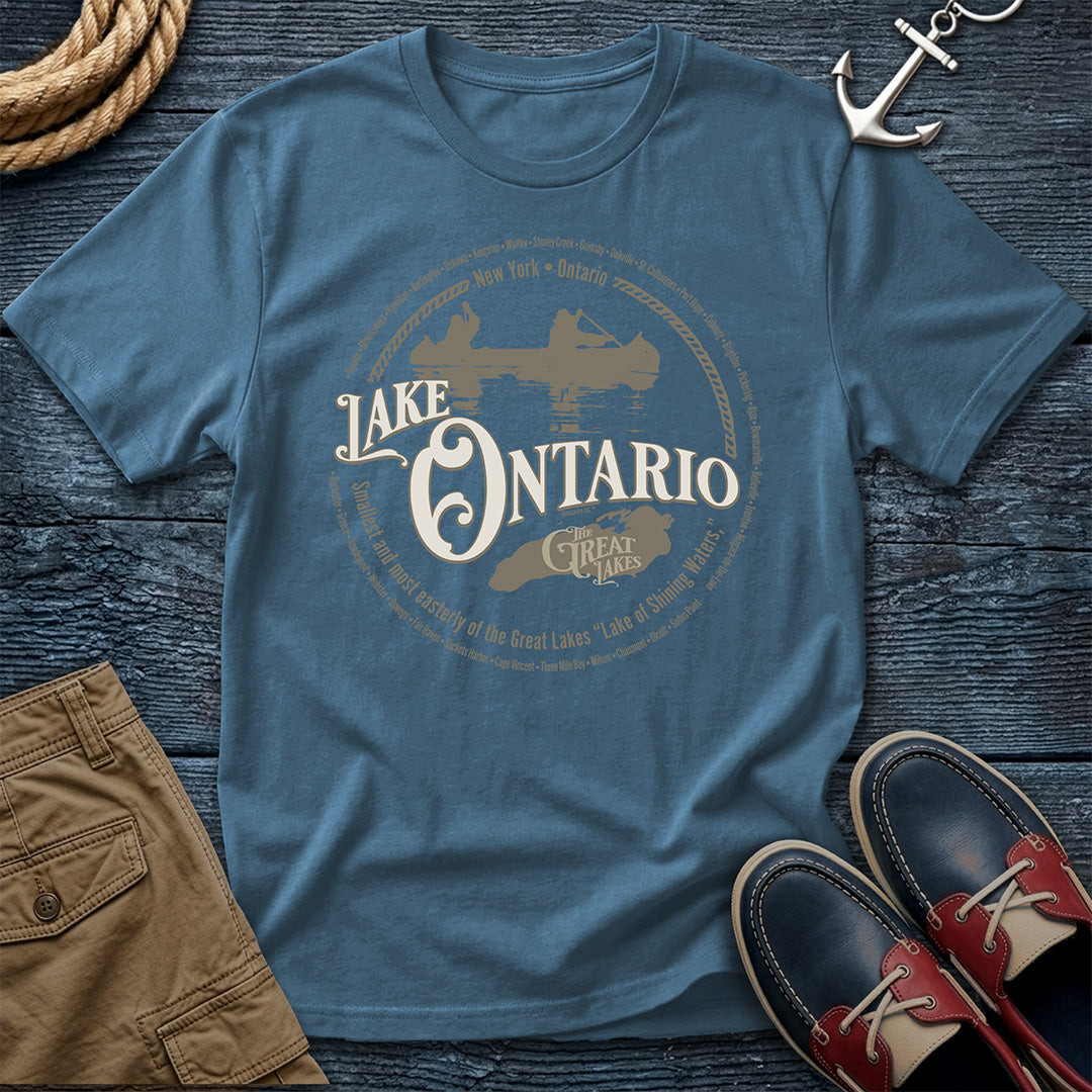 Lake Ontario Great Lakes Denim tee. New York and Ontario shoreline cities. Canoe and lake outline design on Comfort Colors 1717 garment-dyed cotton. The easternmost lake, fully represented.