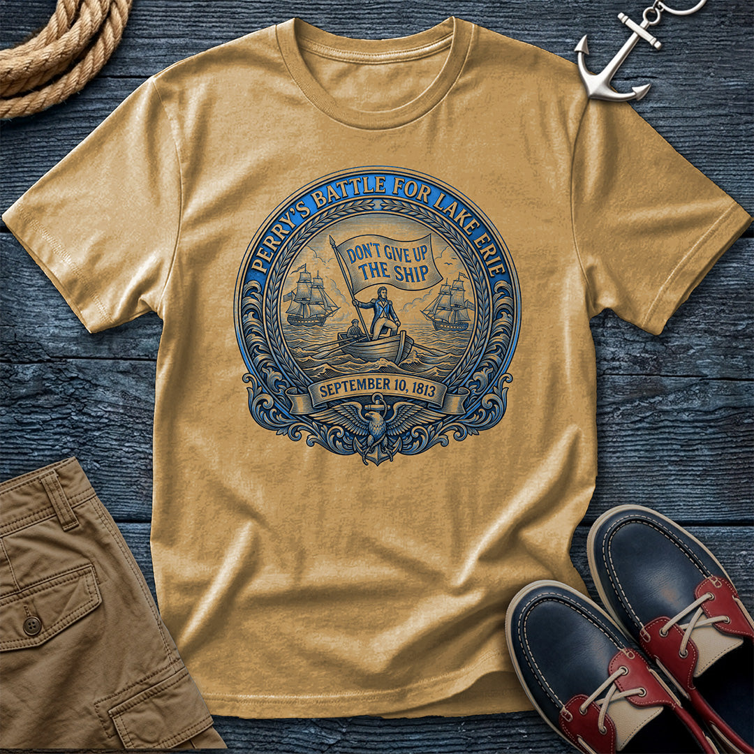 Don't Give Up The Ship Tee in Mustard — Perry's 1813 Lake Erie naval crest graphic on Comfort Colors garment-dyed cotton