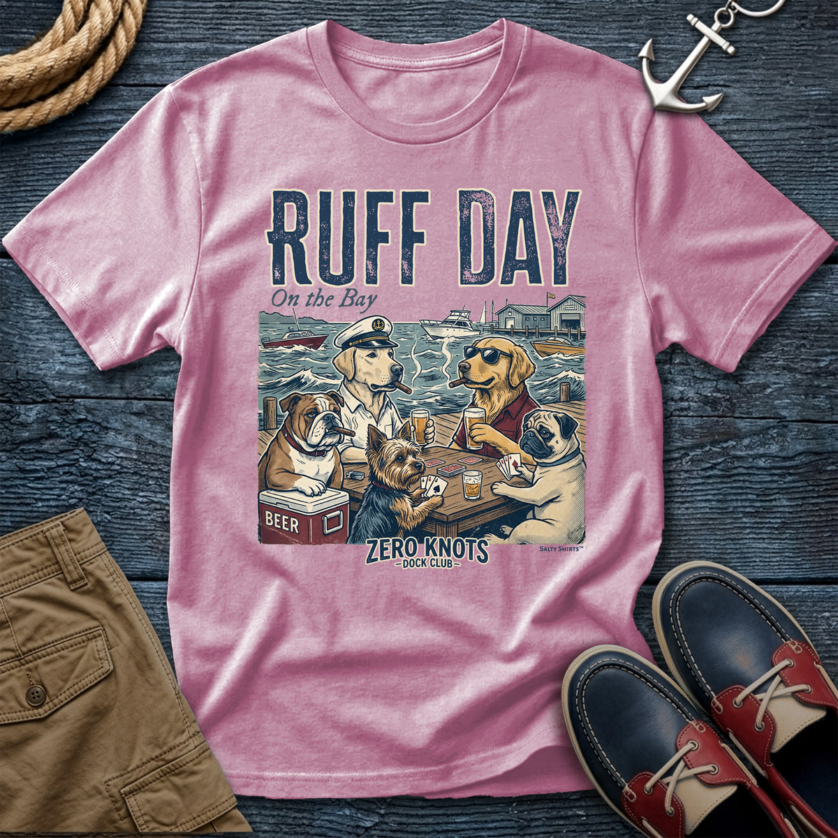 Blossom t-shirt with a graphic design of dogs at a dock, text 'Ruff Day on the Bay.