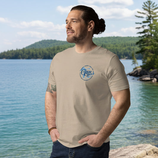 Man looking at the lake wearing The Great Lakes Tee Pocket Logo